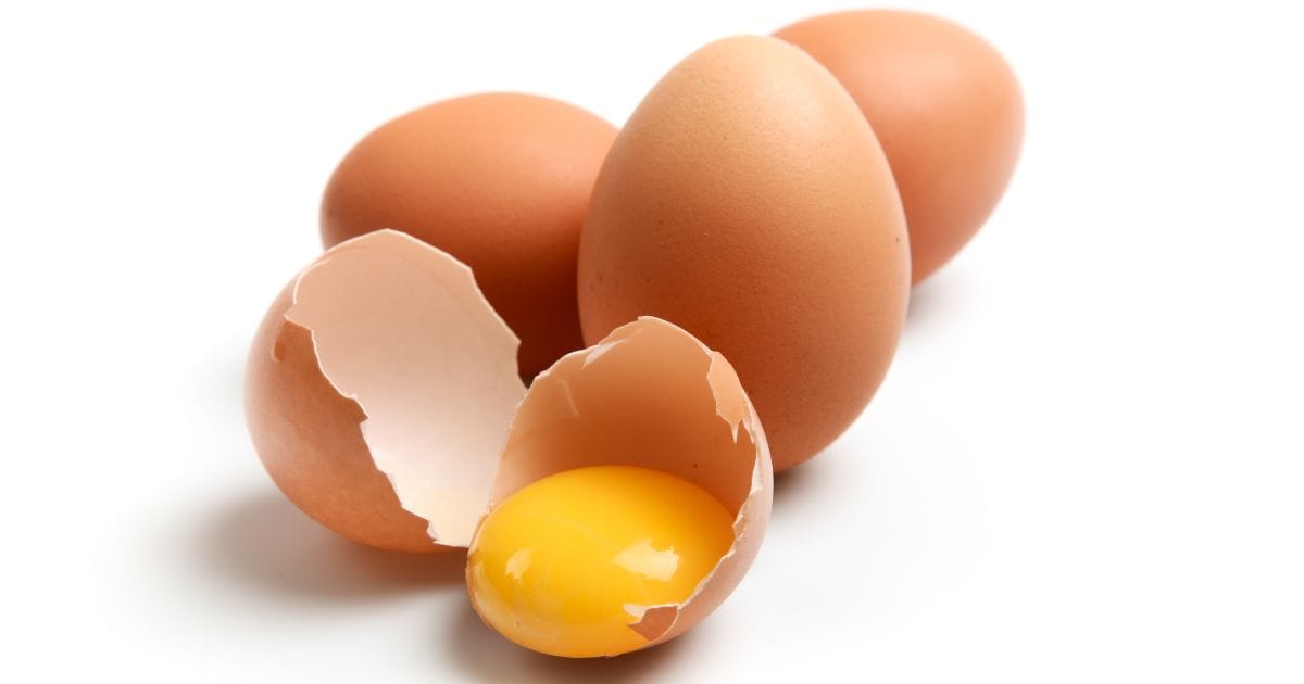 Cost of Eggs For Resturants Image of eggs with one broken egg representing the expensive eggs in 2025