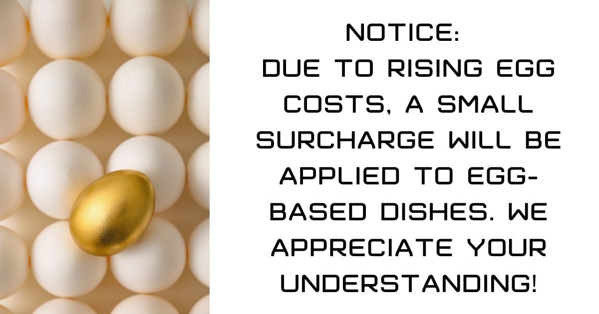 Sign for an egg surcharge in a resturant.